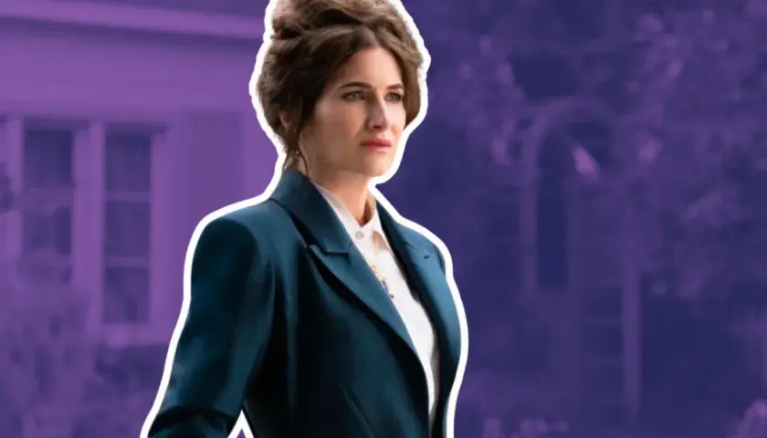 Kobieta w eleganckim kostiumie, z charakterystyczną fryzurą. To zawsze Agatha, gotowa na kolejne wyzwanie.