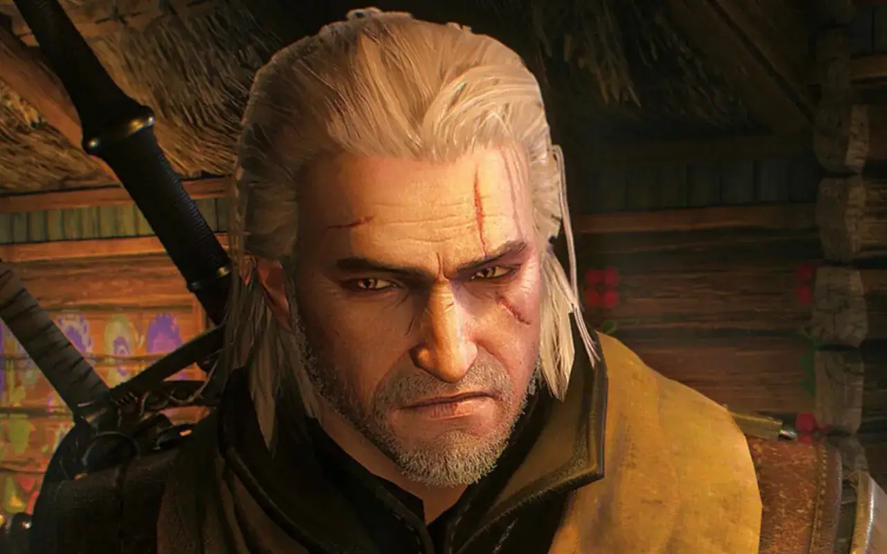 Geralt z Rivii, wiedźmin, którego twarz zdobią blizny, spogląda z determinacją. Kto gra wiedzmina? To on, w swojej zbroi i z mieczami u boku.